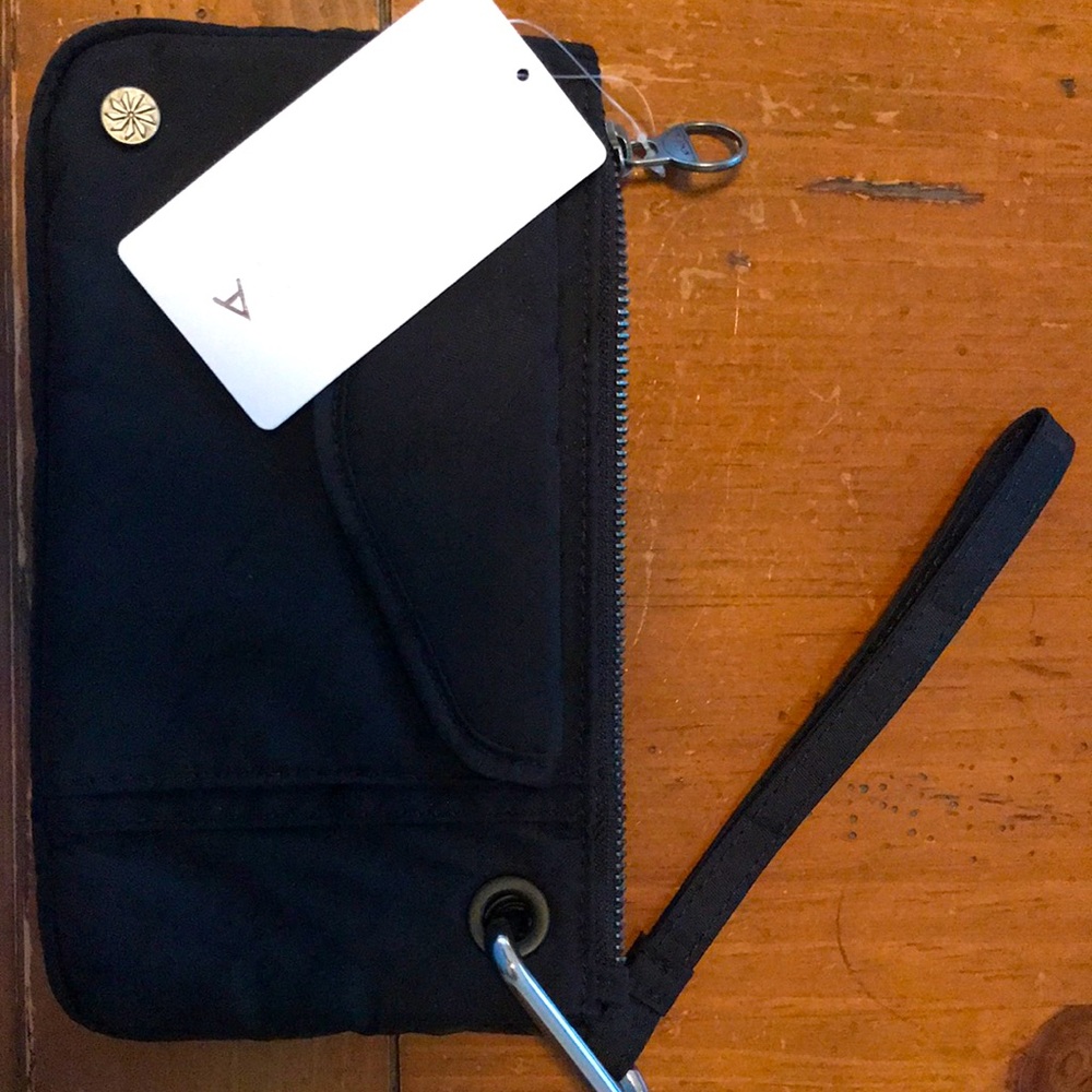 Athletic Coffee Run Clutch. 8 1/4” x 4 3/4 high. Fits cell phones and four cards